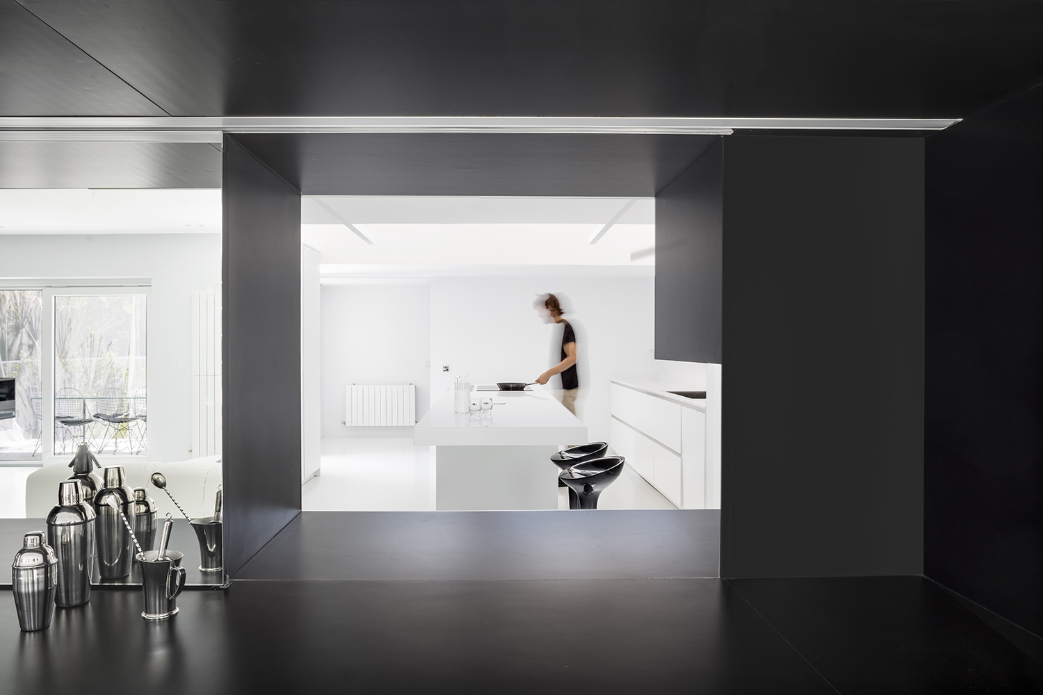 CRU innovative flat renovation project in Barcelona. La Bea, an old apartment renovated into a modern black and white space.