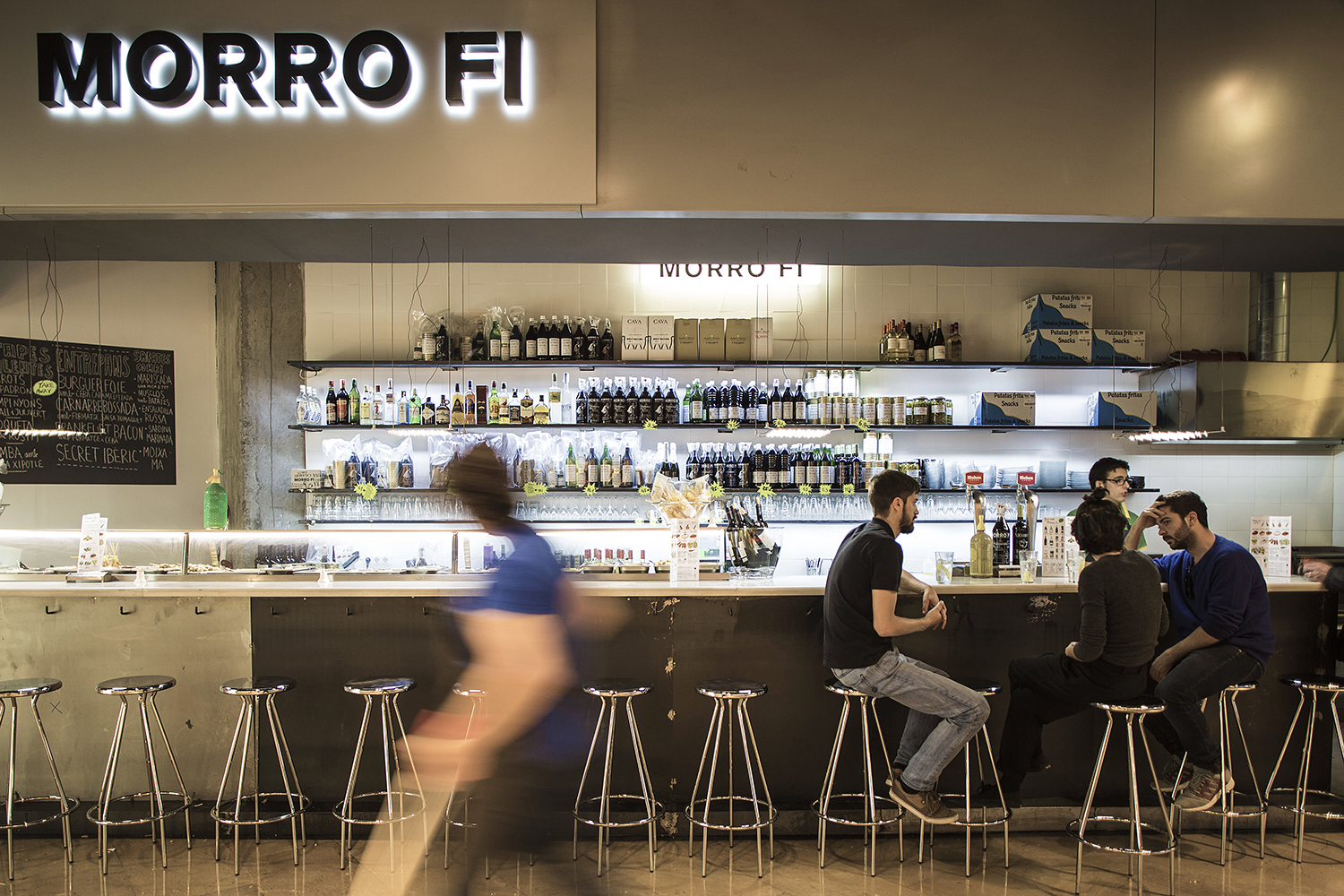 CRU innovative restaurant project in Barcelona. El Morro fi, a patchwork made of iron, led lighting, vermouth and pickles.
